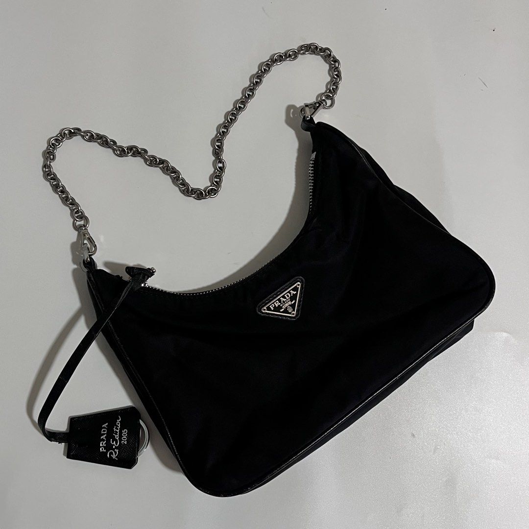 Prada Re-edition 2005 Bag (Category: Shoulder Bags) located in Zamboanga. Submitted by wearwell.ph (Listing ID 1470776091, Image 1). Description: Condition: Excellent ( Please check all the details before purchasing, The bag is pre-loved and the auntenticity is not guaranteed. Bought it from a reseller online. ).