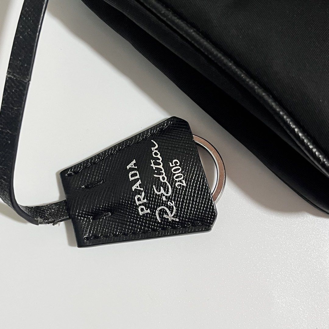 Prada Re-edition 2005 Bag (Category: Shoulder Bags) located in Zamboanga. Submitted by wearwell.ph (Listing ID 1470776091, Image 2). Description: Condition: Excellent ( Please check all the details before purchasing, The bag is pre-loved and the auntenticity is not guaranteed. Bought it from a reseller online. ).