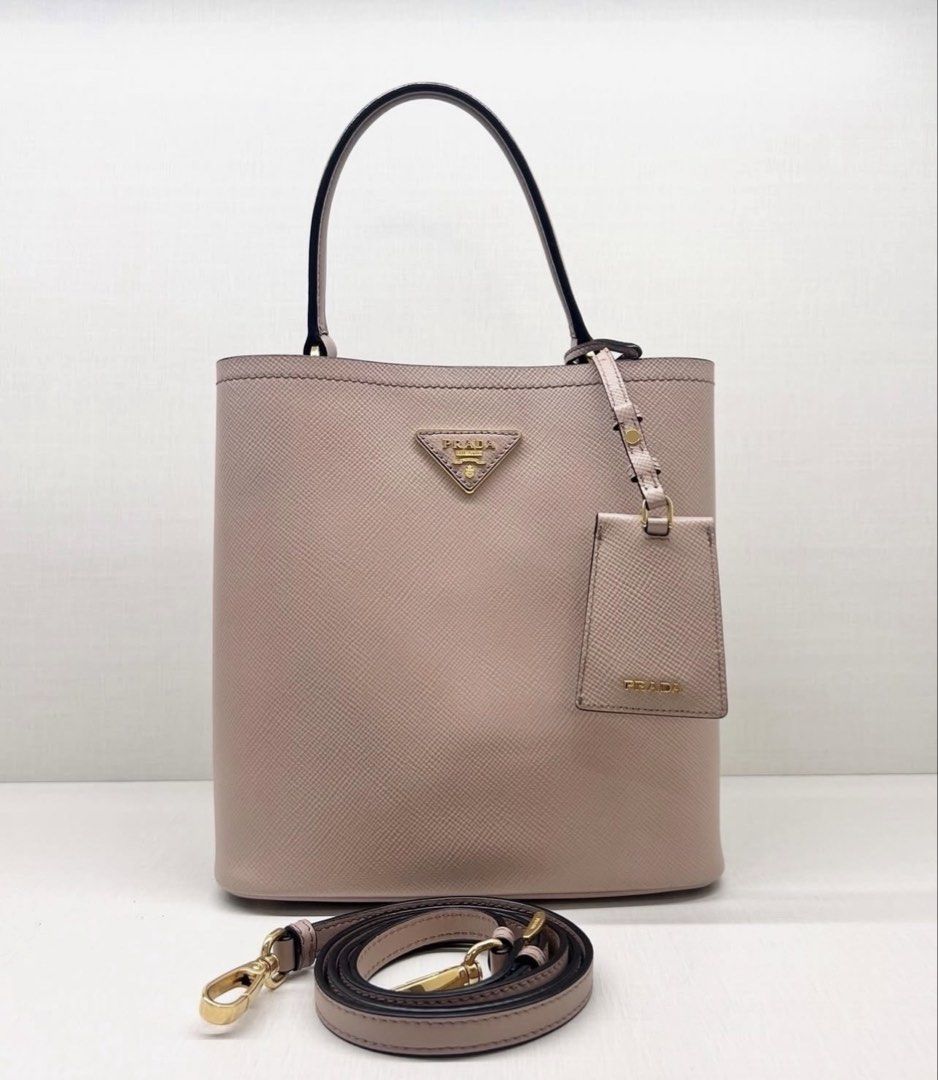 PRADA saffiano medium panier cipria (Category: Luxury Bags & Wallets) located in Tagaytay City. Submitted by eg_gallery (Listing ID 1470832966, Image 1). Description: guaranteed authentic / strap, name tag, receipt.