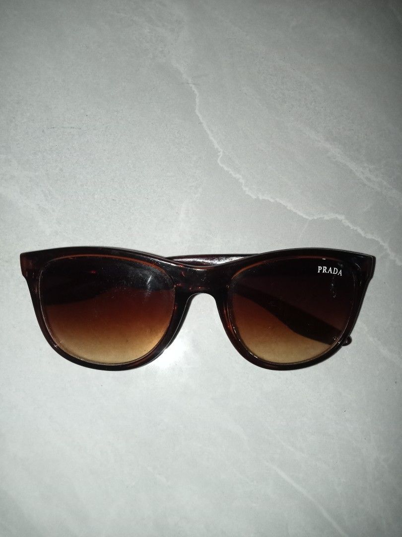 PRADA SUNGLASSES (Category: Sunglasses & Eyewear) located in Iloilo. Submitted by steven.thrift (Listing ID 1470900520, Image 1). Description: PRADA LINEA ROSSA NOT AUTHENTIC.