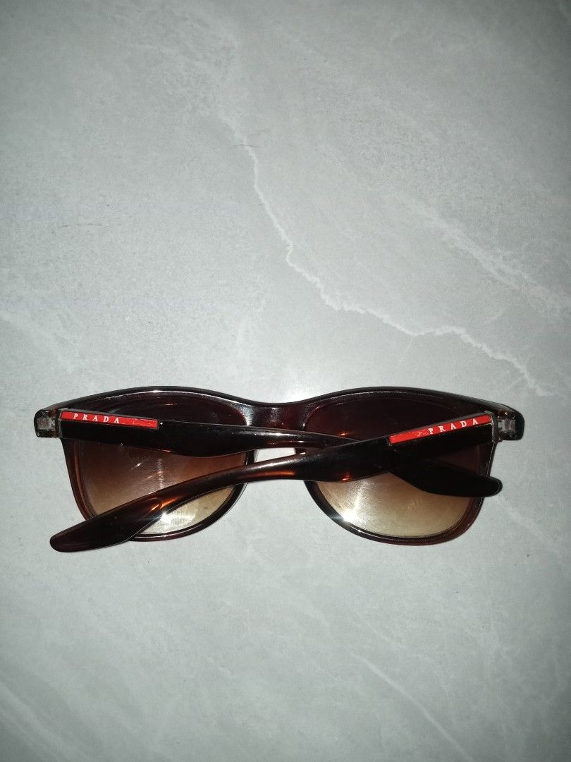 PRADA SUNGLASSES (Category: Sunglasses & Eyewear) located in Iloilo. Submitted by steven.thrift (Listing ID 1470900520, Image 2). Description: PRADA LINEA ROSSA NOT AUTHENTIC.