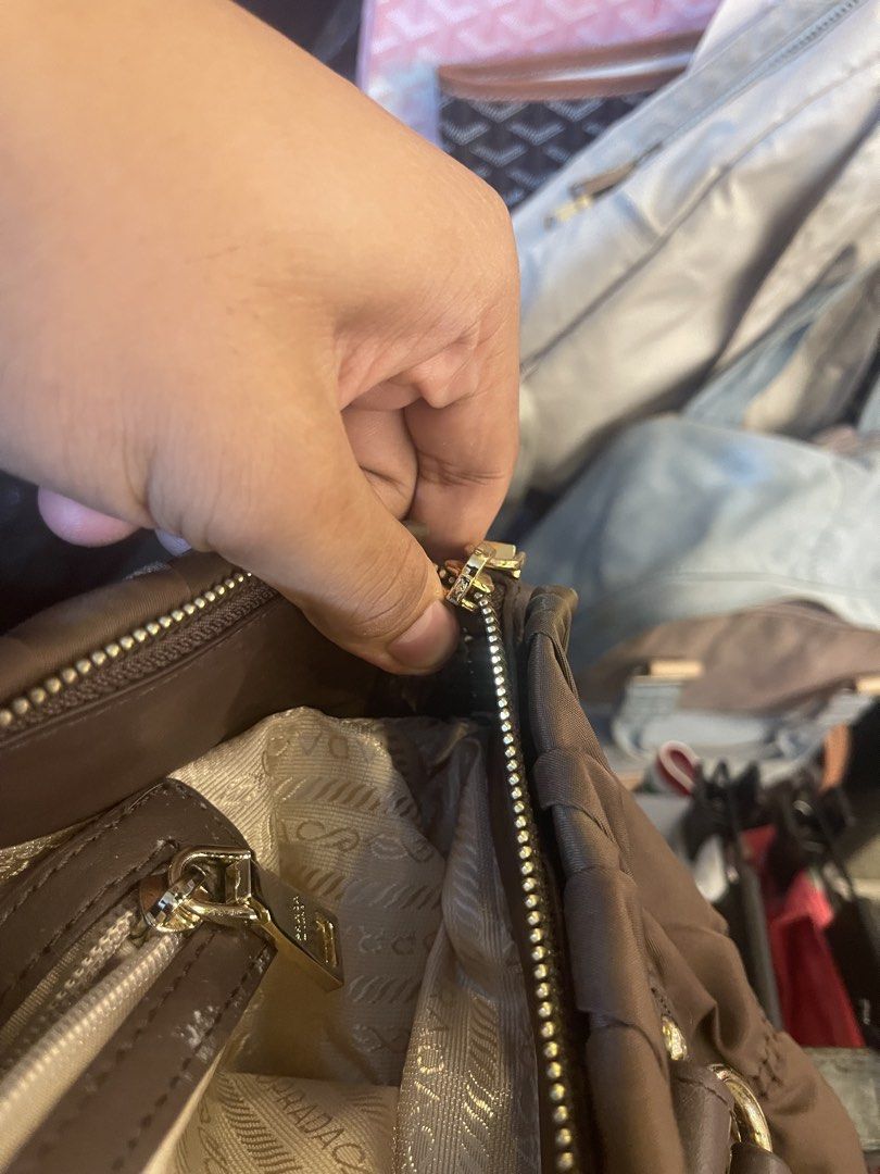 Prada Two Way Bag (Category: Cross-body Bags) located in Tuguegarao City. Submitted by elyks11 (Listing ID 1470872439, Image 3). Description: GOOD AS NEW SOLID FOR PSG MALUWAG.