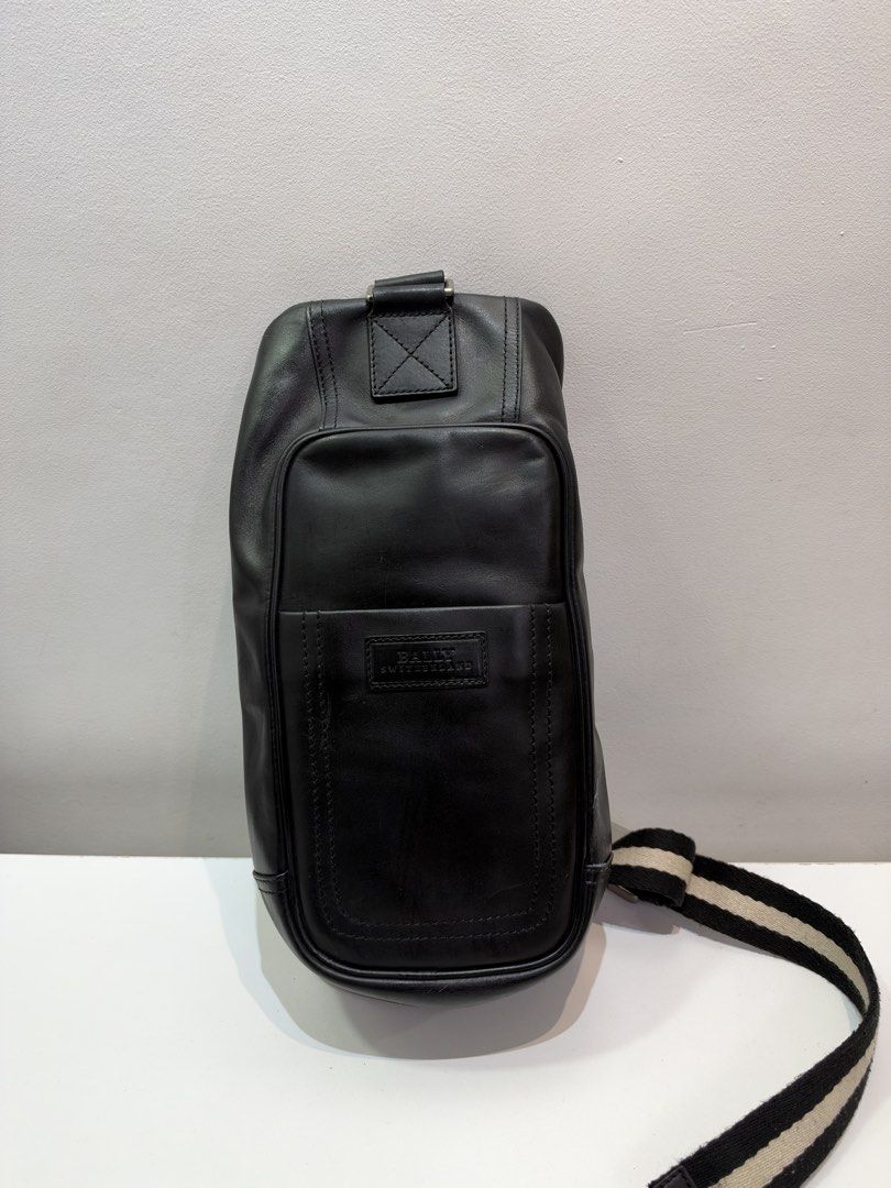 Pre-loved Bally Body Bag (Category: Luxury Bags & Wallets) located in Cebu City. Submitted by brandedcorner_ph (Listing ID 1470922832, Image 1). Description: Pre-loved ((B))ally Body Bag 100% Authentic or money back Condition • Excellent condition • No flaws Product Details •Color: Black •Hardware: Silver tone •Material: Leather •Approximate Dimensions in inches: H16 x W8 x D3.5 Color may vary due to lighting. PM for more photos 🏷️ 5,800 php •Ne