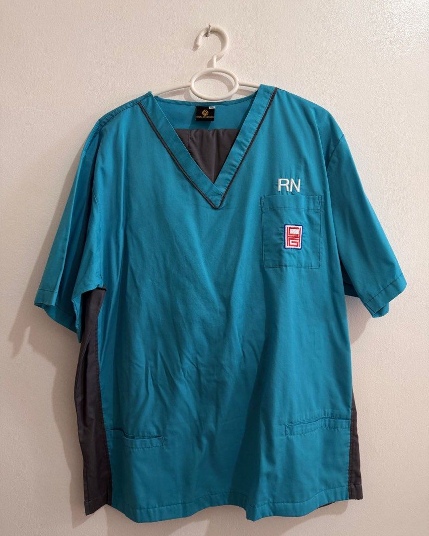Pre-Loved CGHMC Uniform (Blue&Gray) - 2 Sets (Category: Sets or Coordinates) located in Quezon City. Submitted by gomkatph (Listing ID 1470765494, Image 1). Description: Selling my pre-loved CGHMC uniforms. Used for 2 months only. Still in good condition. Body frame: 2XL-3XL, 5'8", 90kg. Comes with: 2x - Top 2x - Bottom Please check measurements provided. Price is fixed unless getting all 3 sets of uniforms. For same day delivery only via grab or