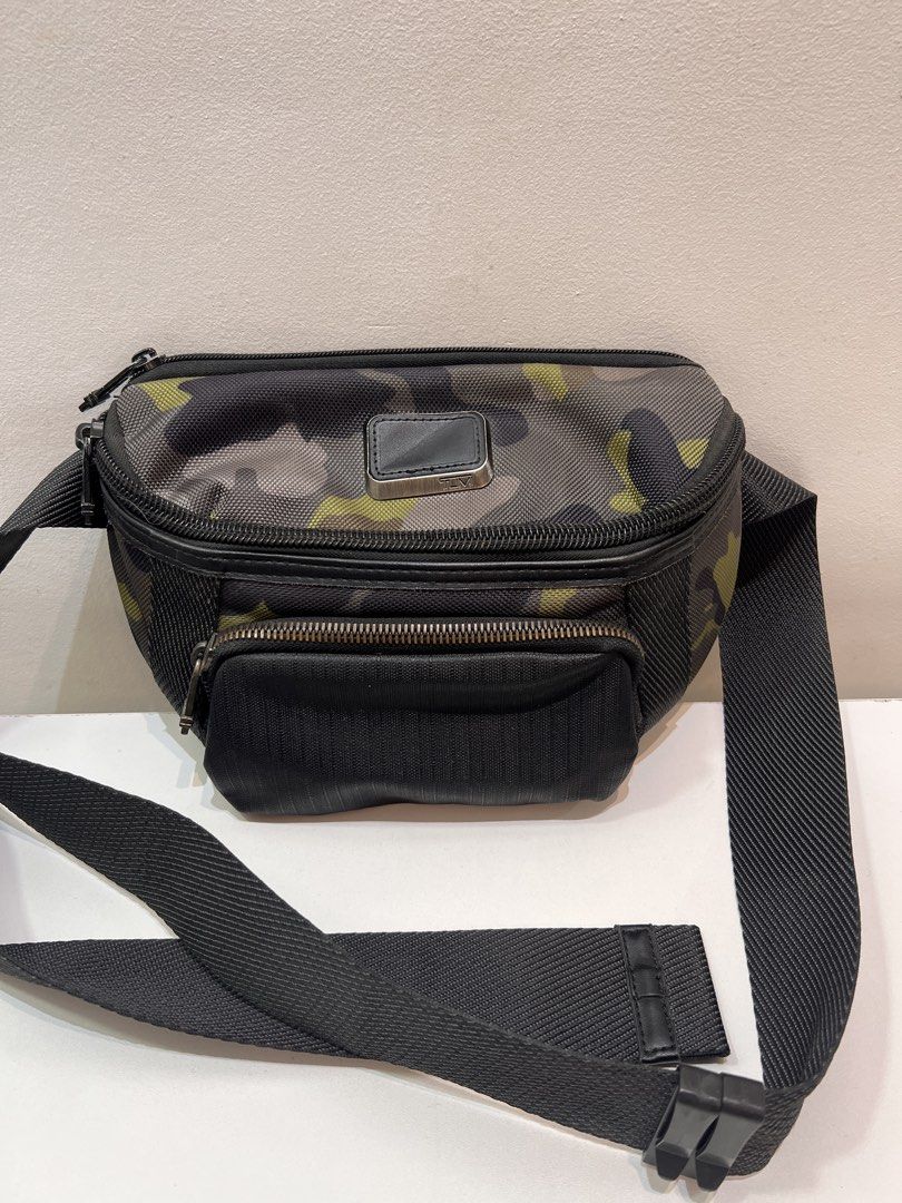 Pre-loved Tumi Alpha Bravo Columbus Body Bag (Category: Luxury Bags & Wallets) located in Cebu City. Submitted by brandedcorner_ph (Listing ID 1470923730, Image 1). Description: Pre-loved ((T))umi Alpha Bravo Columbus Body Bag 100% Authentic or money back Condition • Excellent condition • Minor signs of wear only • May yupi konti ang plate, nasa last pic Product Details •Color: Green and black camouflage •Hardware: Silver tone •Material: Canvas &