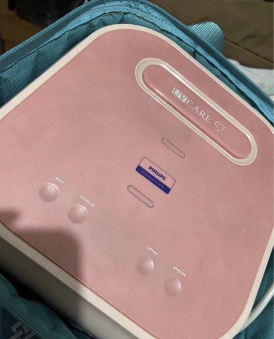 PRELOVED UV Care UV Sterilizer (Category: Breastfeeding & Bottle Feeding) located in Marikina City. Submitted by teddiescloset (Listing ID 1470864616, Image 1). Description: PRELOVED UV Care UV Sterilizer 💰 Selling Price: ₱2,900 🏷️ Original Price: ₱8,650 Condition: Preloved, AS IS, WHERE IS. * With visible signs of use. * Comes with UV Care storage/carrying bag. * RFS: No longer needed. UV Care sterilizer in pink, designed for sanitizing baby e