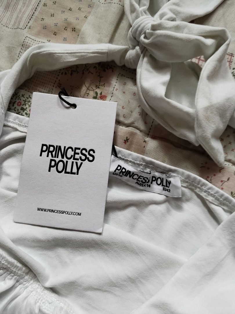 Princess Polly White halter top (Category: Sleeveless) located in Cebu City. Submitted by thrift_with_anjel (Listing ID 1470855865, Image 3). Description: ❀.ೃ࿔White halter top❀.ೃ࿔* 🌹Brand: Princess Polly 🥀Flaw: small stain 🌸Bust: 28-44 🌸Waist: 30-42 🌷Mine: 199(AU).