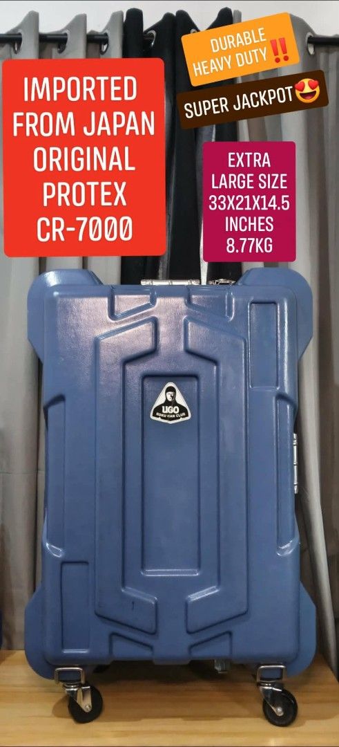 Protex CR-7000 Extra Large Hard Shell Luggage (Category: Luggage) located in Valenzuela. Submitted by gracebacot17959 (Listing ID 1470840758, Image 1). Description: - Authentic Protex CR-7000 imported directly from Japan - Heavy-duty blue hard shell exterior with custom sticker decals - Massive extra-large size: 33 x 21 x 14.5 inches - Weight: 8.77 kg - Secure metal latches and sturdy hinges for maximum protection - Smooth rolling caster wheels f