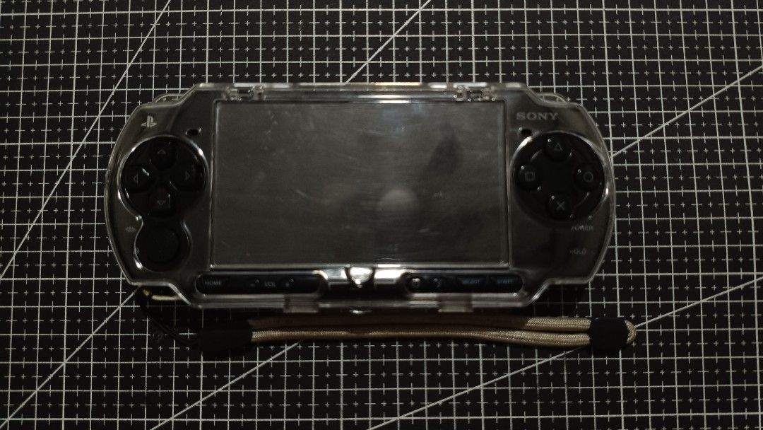 PSP 2000 Modded (w/ Crystal Case & Charger) (Category: PlayStation) located in Manila. Submitted by ken.zie (Listing ID 1470876882, Image 2). Description: Selling this PSP 2000 for 2000! In good working condition Comes with crystal case, charger, original battery, and 8GB MicroSD with MS-Pro Duo adapter Modded with Pro-C2 Comes with games and emulators Honest issue: scratch sa may aluminum ng UMD panel lid. No other issues. Payment can be made vi
