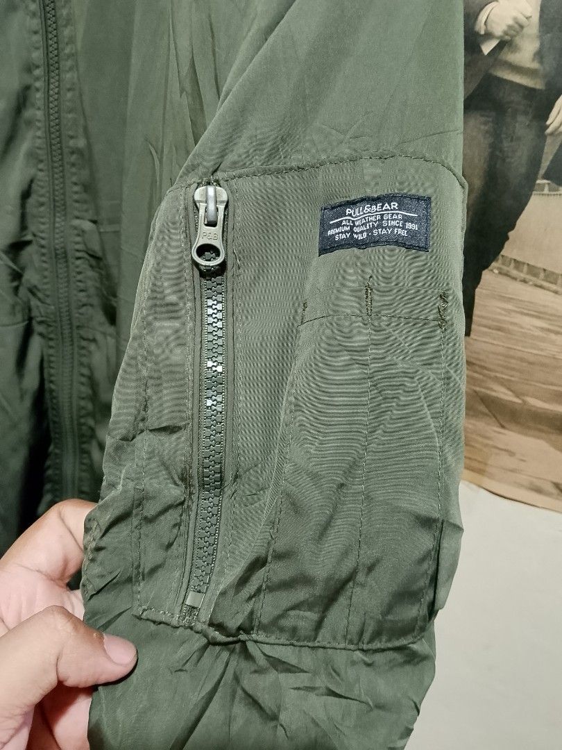 Pull&Bear Green Bomber Jacket Size M (Category: Coats, Jackets and Outerwear) located in Manila. Submitted by emmanlacno47414 (Listing ID 1470748943, Image 3). Description: Med on tag Width 20-21 Length 28 No issue/No flaws 9.8/10 Colorate Excellent Condition 500 free ship.