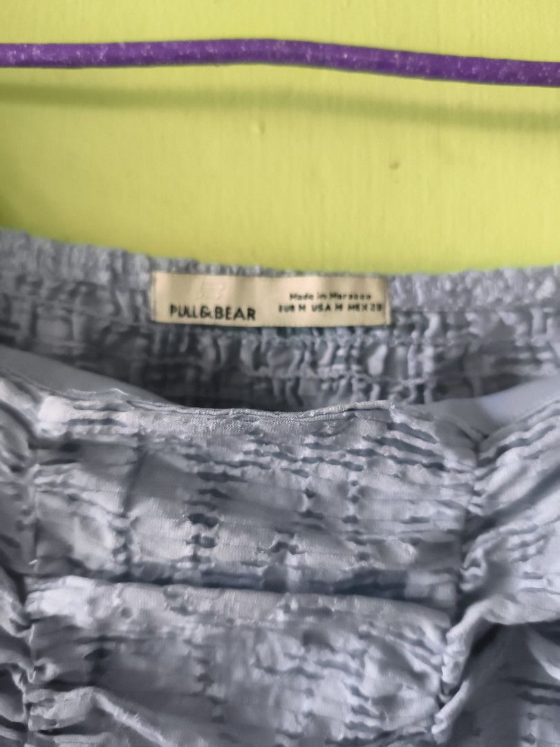 Pull&Bear Light blue Ruched Puff Sleeve Crop Top (Category: Blouses) located in Bulacan. Submitted by jvblaguard08460 (Listing ID 1470751790, Image 2). Description: - Brand: Pull&Bear - Size: M (Fits true to size) - Color: Pastel purple - Material/Pattern: Textured fabric made in Morocco - Details: Square neckline, ruched front & back, short puff sleeves - Styling: Great with high-waisted jeans or skirts.