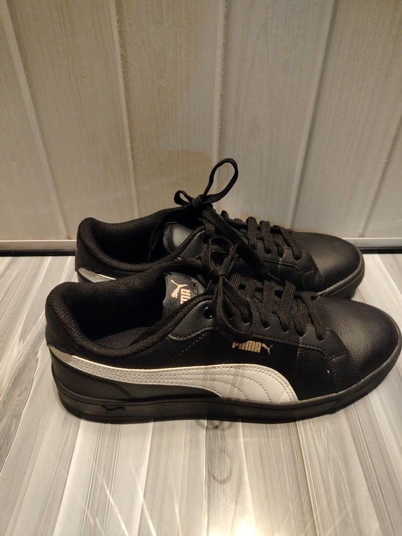 Puma Grounded SL II (black, white, gold) (Category: Sneakers) located in Quezon City. Submitted by stacey_bluey (Listing ID 1470810098, Image 1). Description: - Brand: Puma - Color: Black leather with white side stripes - Details: Gold Puma branding on side, tongue, and heel - Original Puma sneakers - Closure: Lace-up with black laces - Condition: Soles show minimal wear with fully intact tread, clean interior lining - Features: QR code printed o