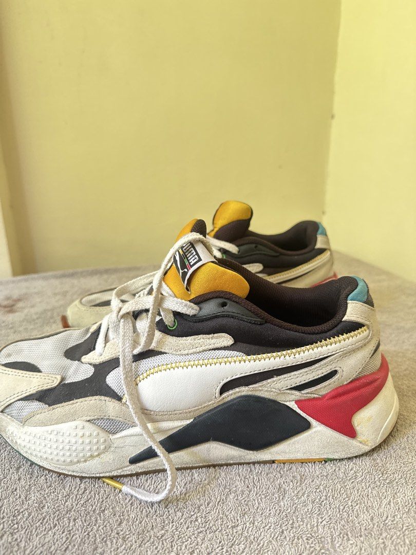 Puma RS-X Multicolour Sneakers (Category: Sneakers) located in Calamba. Submitted by xacalixa (Listing ID 1470799594, Image 3). Description: Puma RS-X chunky sneakers in a multicolour design featuring white, black, yellow, red, and blue accents. Iconic Formstrip on the sides with distinctive stitching. Breathable mesh upper panels paired with supportive overlays and thick cushioning soles. Classic branding on the tongue tag..