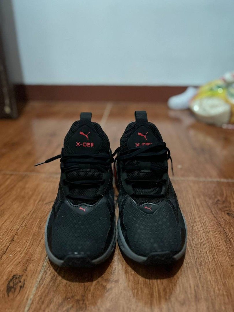 Puma X-Cell Black and Red Running Shoes (Category: Sneakers) located in Manila. Submitted by mabuyoocar74431 (Listing ID 1470865064, Image 3). Description: - Brand: Puma X-Cell - Colorway: Sleek black with bold red and grey accents - Upper: Breathable mesh material for all-day comfort - Sole: Chunky, durable soles with reliable grip patterns - Fit & Support: Comfortable padding around the ankle collar and secure lace-up closure - Convenience: Hee