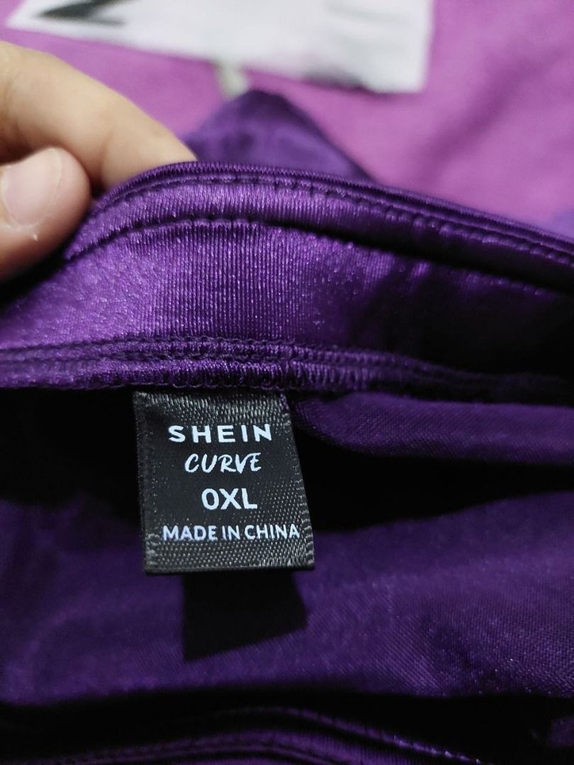Purple Ruched Skirt (Category: Skirts) located in Bulacan. Submitted by nicschill18300 (Listing ID 1470869853, Image 2). Description: - Brand: SHEIN Curve - Size: 0XL - Color: Vibrant Purple - Design: Flattering ruched style - Condition: Excellent, like new - Perfect for casual outings, parties, or everyday wear - Features a glossy, satin-like finish - Ruched and gathered detailing for a draped look - High-slit design for a stylish, statement loo