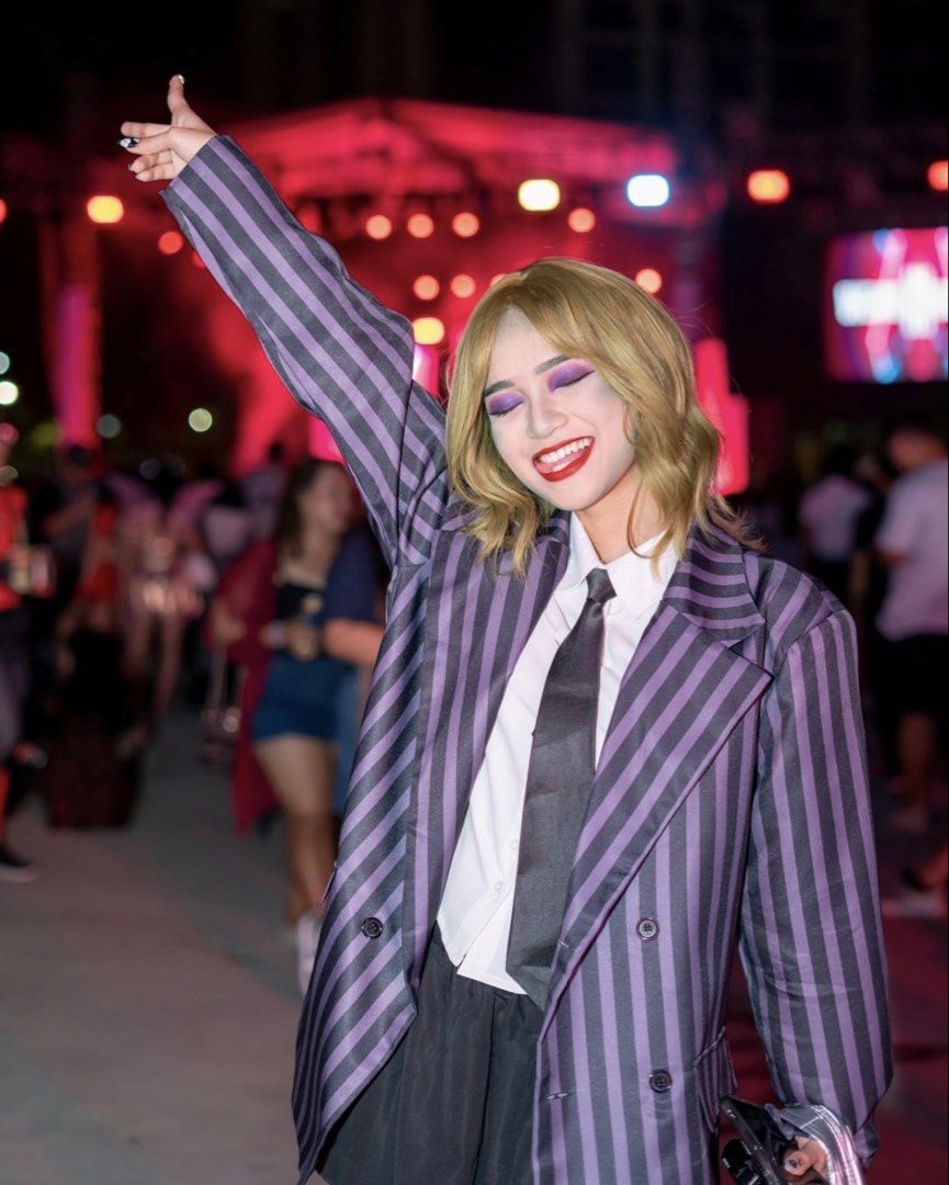 Purple Striped Oversized Blazer ONLY (BEETLEJUICE Halloween Costume) (Category: Coats, Jackets and Outerwear) located in Quezon City. Submitted by va_v2 (Listing ID 1470839607, Image 2). Description: - Style: Oversized double-breasted blazer - Color/Pattern: Purple with dark stripes - Details: Structured shoulders, dark front buttons - Fit: Roomy and great for layering over shirts or tees - Condition: Worn once, flawless and clean.