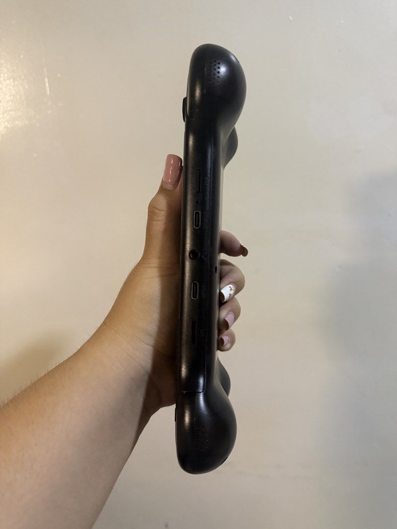 QRD Vortex F5 Handheld Game Console (Category: Nintendo) located in Daet. Submitted by shandra21 (Listing ID 1470908600, Image 3). Description: QRD Vortex F5 handheld console in black. Fully working, great for retro gaming on the go, and ready to use. SPECS: 1GB RAM 5000mAh 5.5 hd ips display comes with 128gb SD with free 20k+++ offlien games. retro to PSP.