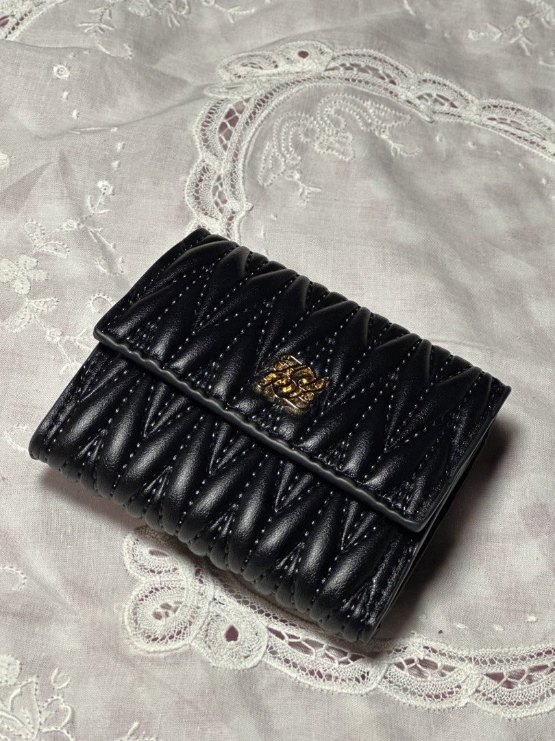 Quilted Black Trifold Black Wallet Small (Category: Wallets & Card holders) located in Davao. Submitted by favoritepreloved (Listing ID 1470911259, Image 3). Description: 💜 In very Excellent Condition 💜 Fix price.