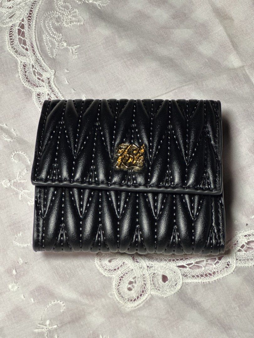 Quilted Black Trifold Black Wallet Small (Category: Wallets & Card holders) located in Davao. Submitted by favoritepreloved (Listing ID 1470911259, Image 1). Description: 💜 In very Excellent Condition 💜 Fix price.