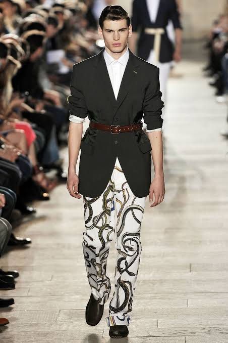 Raf Simons - S/S10 - Snake Pants (Category: Chinos) located in Pasig City. Submitted by on_the_trend (Listing ID 1470807111, Image 2). Description: Tagged size: 44 Condition: 8.5/10 Flaws: Minor color bleeding, Minor yellow stain Made in: Italy Measurement: Waist: 15 inches Front rise: 12 inches Thigh: 11 inches Knee: 8.5 inches Inseam: 30 inches Length: 42 inches Leg opening: 8.5 inches.