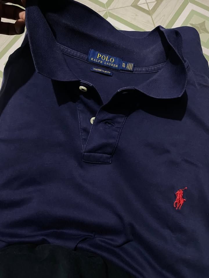 Ralph Lauren Pima Strech Navy Blue (Category: Tshirts & Polo Shirts ) located in Caloocan City. Submitted by lthrifts993 (Listing ID 1470850421, Image 3). Description: Ralph Lauren Pima Strech Navy Blue 24x27 Color Rate: 10/10 Issue: None.