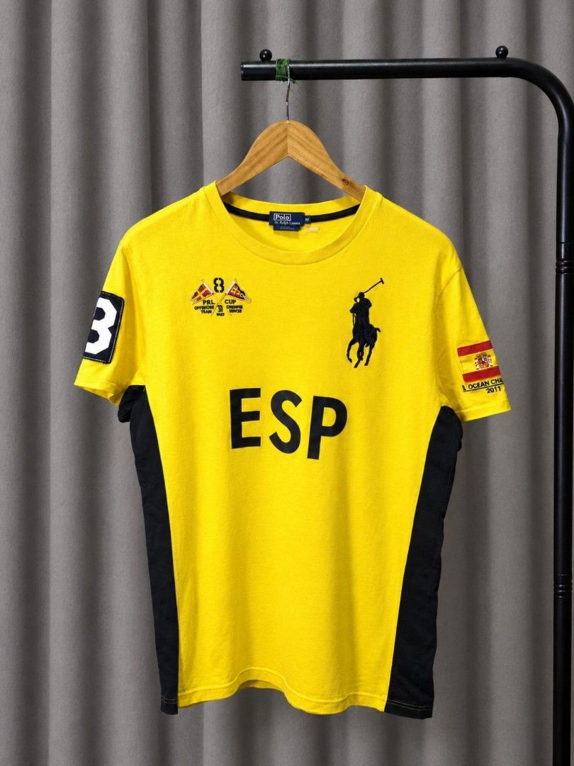 RALPH LAUREN SPAIN OCEAN CHALLENGE SHIRT (Category: Tshirts & Polo Shirts ) located in Davao. Submitted by blazing.rachel02 (Listing ID 1470848254, Image 1). Description: XL (youth) on tag 20 x 27.5 (fits medium) Bagong bago pa No issue.