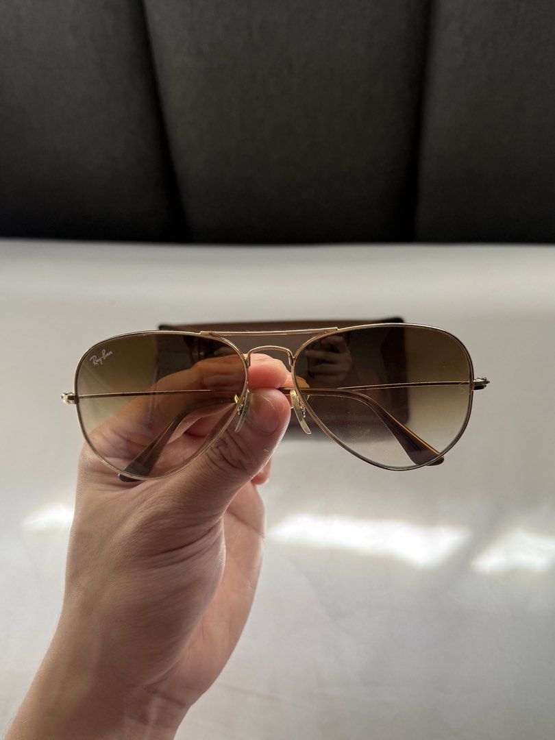 Ray-Ban RB3445 Polarized Sunglasses (Category: Sunglasses & Eyewear) located in Paranaque City. Submitted by _ranieee (Listing ID 1470795455, Image 2). Description: 🕶️ Ray-Ban Sunglasses for Sale Selling these Ray-Ban sunglasses! Both come with their respective cases. 🤎 Pair 1: RB3025 Aviator Large Metal * Gold-tone metal frame * Brown gradient lenses * Comes with a brown Ray-Ban case 🖤 Pair 2: RB3445 Polarized Black * Black frame * Dark lense