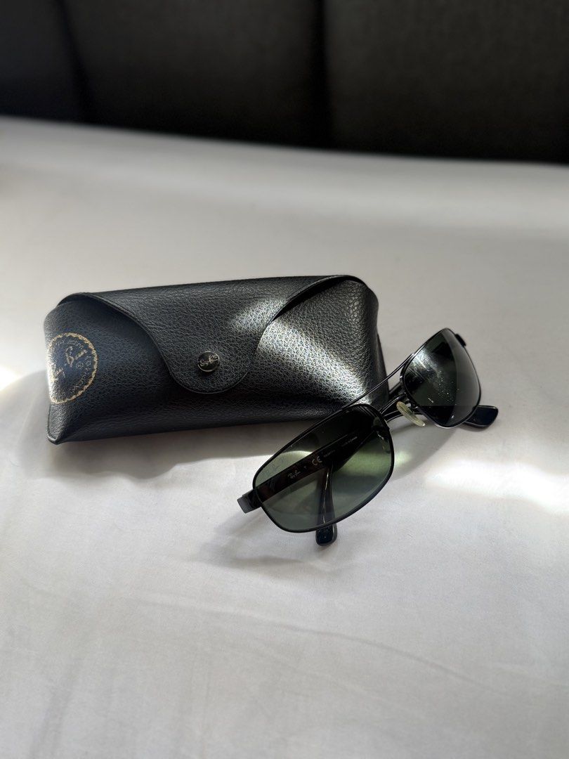 Ray-Ban RB3445 Polarized Sunglasses (Category: Sunglasses & Eyewear) located in Paranaque City. Submitted by _ranieee (Listing ID 1470795455, Image 3). Description: 🕶️ Ray-Ban Sunglasses for Sale Selling these Ray-Ban sunglasses! Both come with their respective cases. 🤎 Pair 1: RB3025 Aviator Large Metal * Gold-tone metal frame * Brown gradient lenses * Comes with a brown Ray-Ban case 🖤 Pair 2: RB3445 Polarized Black * Black frame * Dark lense