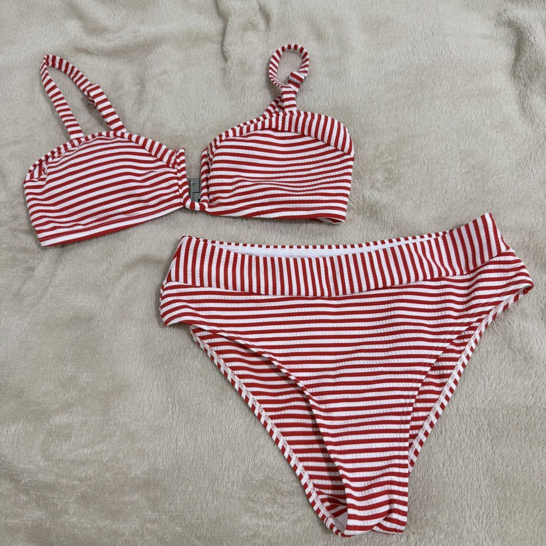 Red and White Striped Ribbed Two-Piece Bikini (Category: Bikinis & Swimsuits) located in Manila. Submitted by kbm._. (Listing ID 1470929746, Image 1). Description: - Red and white striped ribbed bikini set - Two-piece design with adjustable straps and front clasp closure - Matching high-waisted bottoms for a cute retro look - Soft, stretchy, and comfortable material - Perfect for swimming, pool days, and vacations.