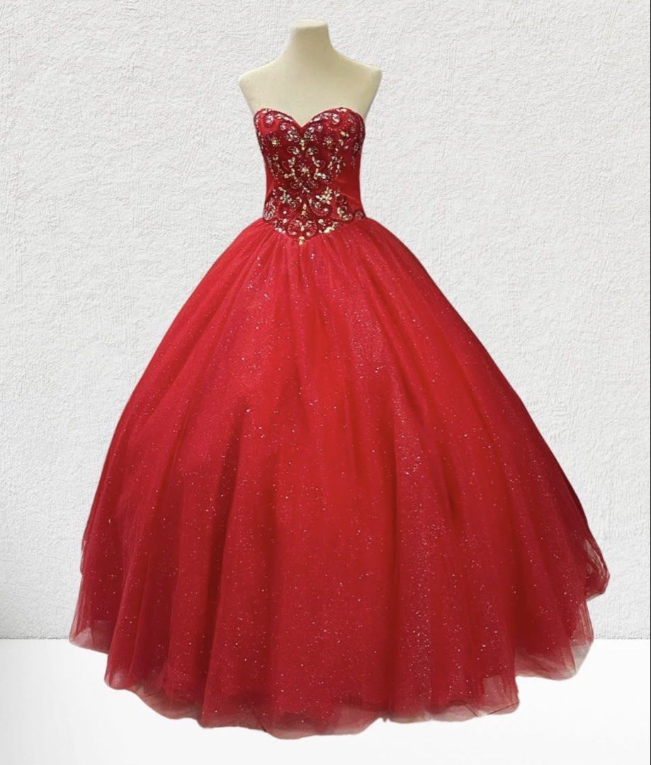 Red Ball Gown For Sale (Category: Evening dresses & gowns) located in Davao. Submitted by yvnsell (Listing ID 1470754512, Image 3). Description: Stunning vibrant red ball gown / quinceañera dress, perfect for proms, pageants, or formal parties. • Design & Details: Sweetheart neckline with intricate red floral lace appliques, dazzling iridescent rhinestones, and beads densely embellished across the bodice. • Skirt: Voluminous, multi-layered tulle 