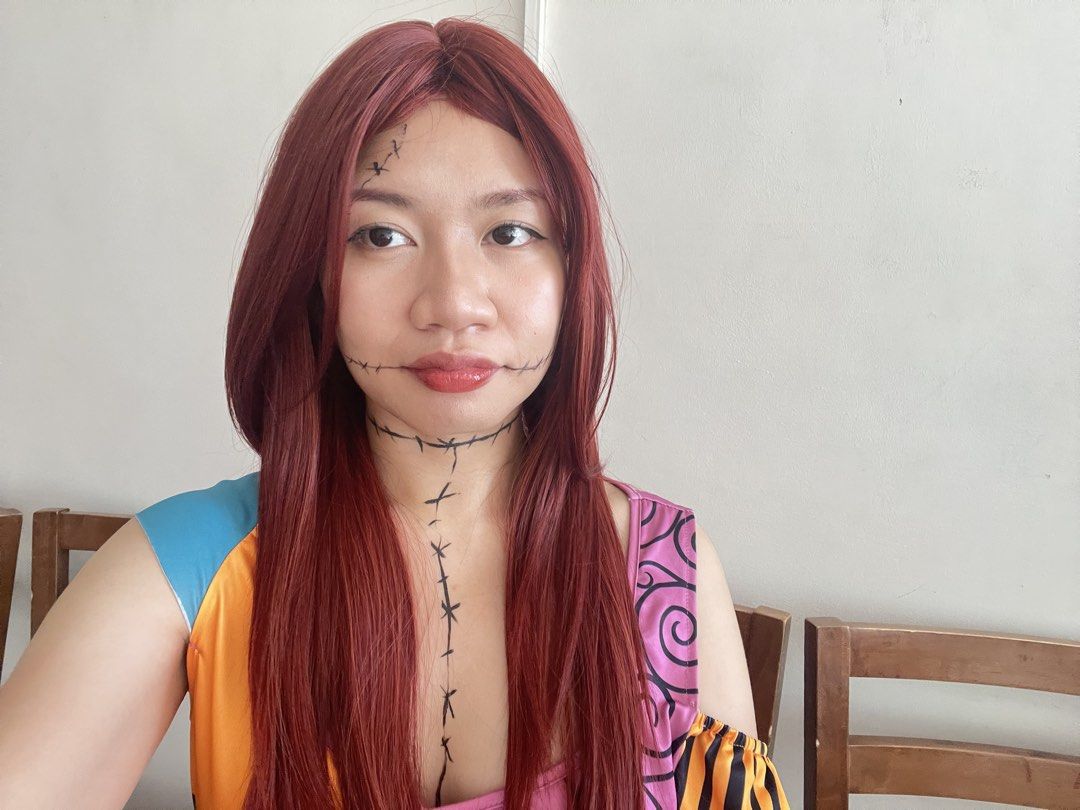 Red Wig JBSELECT4YOU Halloween (Category: Hair Accessories) located in Bulacan. Submitted by myeco014 (Listing ID 1470849221, Image 3). Description: Used once Bought from tiktok shop w/ wispy bangs just tuck in the wig cap on pics.