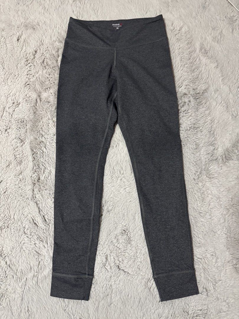 Reebok Speedwick Grey Athletic Leggings Size M (Category: Activewear) located in Calamba. Submitted by cheriiv (Listing ID 1470748988, Image 1). Description: - Brand: Reebok - Item: Speedwick Leggings - Color: Dark Grey Heather - Size: Medium (M) - Features: Moisture-wicking fabric to keep you dry, comfortable elastic waistband with printed logo, and subtle branding on the back hip.
