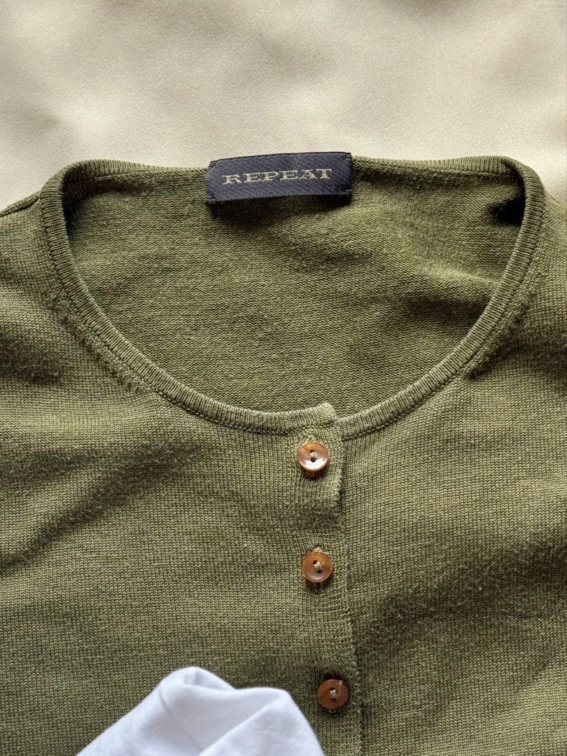REPEAT Olive Green Knit Button Cardigan (Category: Coats, Jackets and Outerwear) located in Las Pinas. Submitted by flyfarflower (Listing ID 1470898200, Image 3). Description: Actual pictures posted 📸. J&T Express or Lalamove/Grab 📦 Fits XS-L Bust: 38” + stretch Length: 21”.