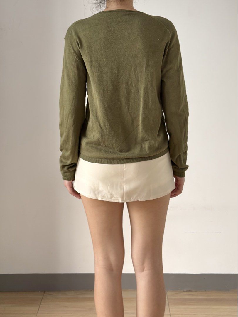 REPEAT Olive Green Knit Button Cardigan (Category: Coats, Jackets and Outerwear) located in Las Pinas. Submitted by flyfarflower (Listing ID 1470898200, Image 2). Description: Actual pictures posted 📸. J&T Express or Lalamove/Grab 📦 Fits XS-L Bust: 38” + stretch Length: 21”.