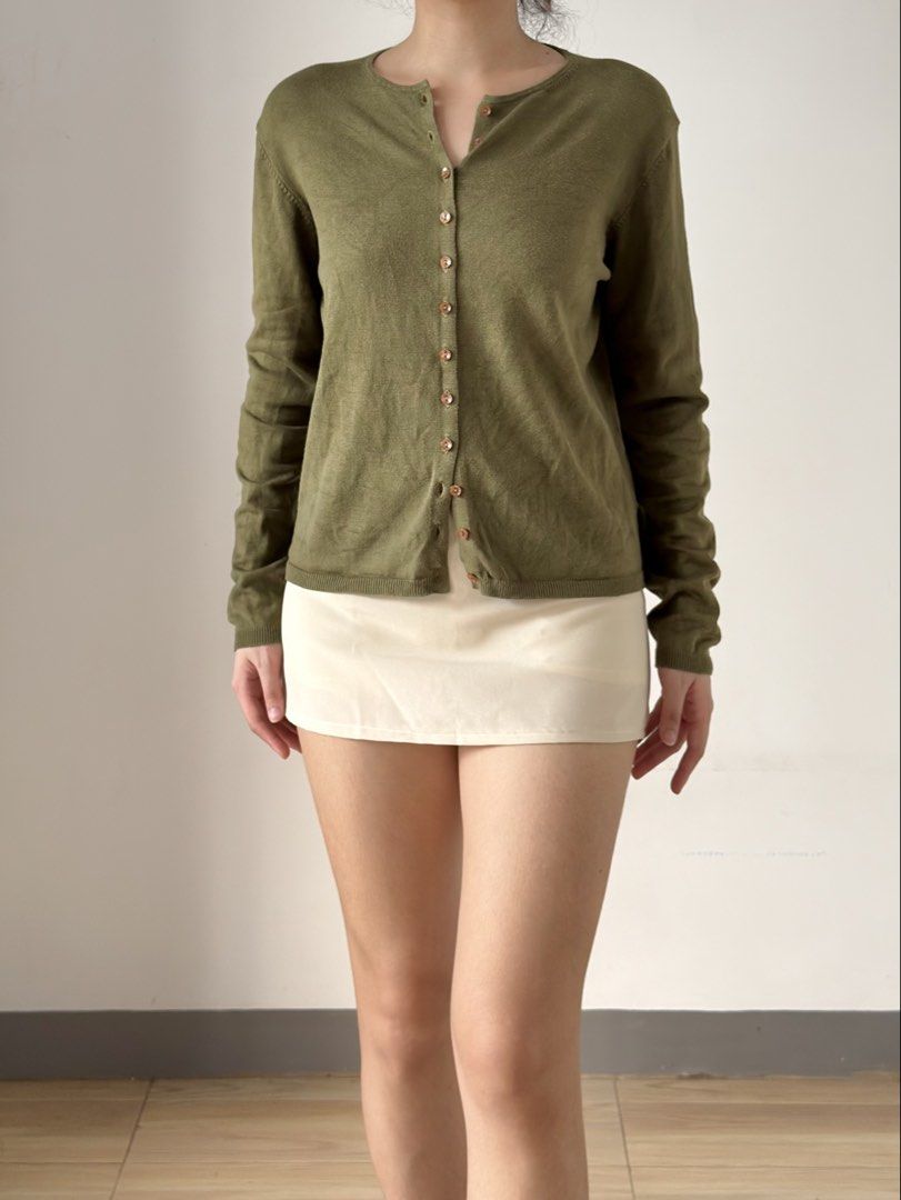 REPEAT Olive Green Knit Button Cardigan (Category: Coats, Jackets and Outerwear) located in Las Pinas. Submitted by flyfarflower (Listing ID 1470898200, Image 1). Description: Actual pictures posted 📸. J&T Express or Lalamove/Grab 📦 Fits XS-L Bust: 38” + stretch Length: 21”.