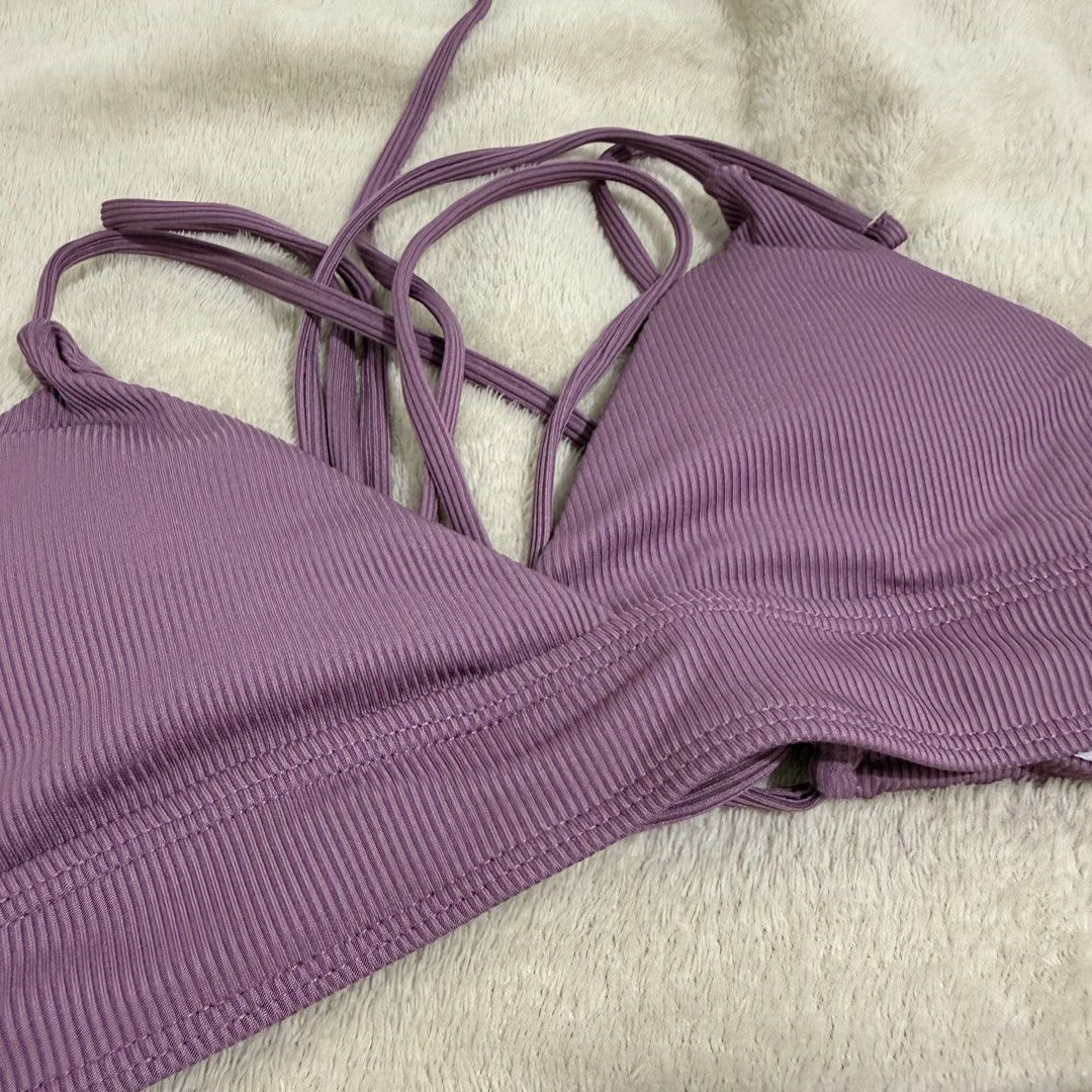 Ribbed Purple Bikini Set High-Waisted Halter (Category: Bikinis & Swimsuits) located in Manila. Submitted by kbm._. (Listing ID 1470929747, Image 2). Description: - Color: Mauve purple - Material: Stretchy ribbed fabric - Top: Halter style with multi-strap back design - Bottoms: High-waisted with cute side tie details - Condition: Clean and ready to wear.