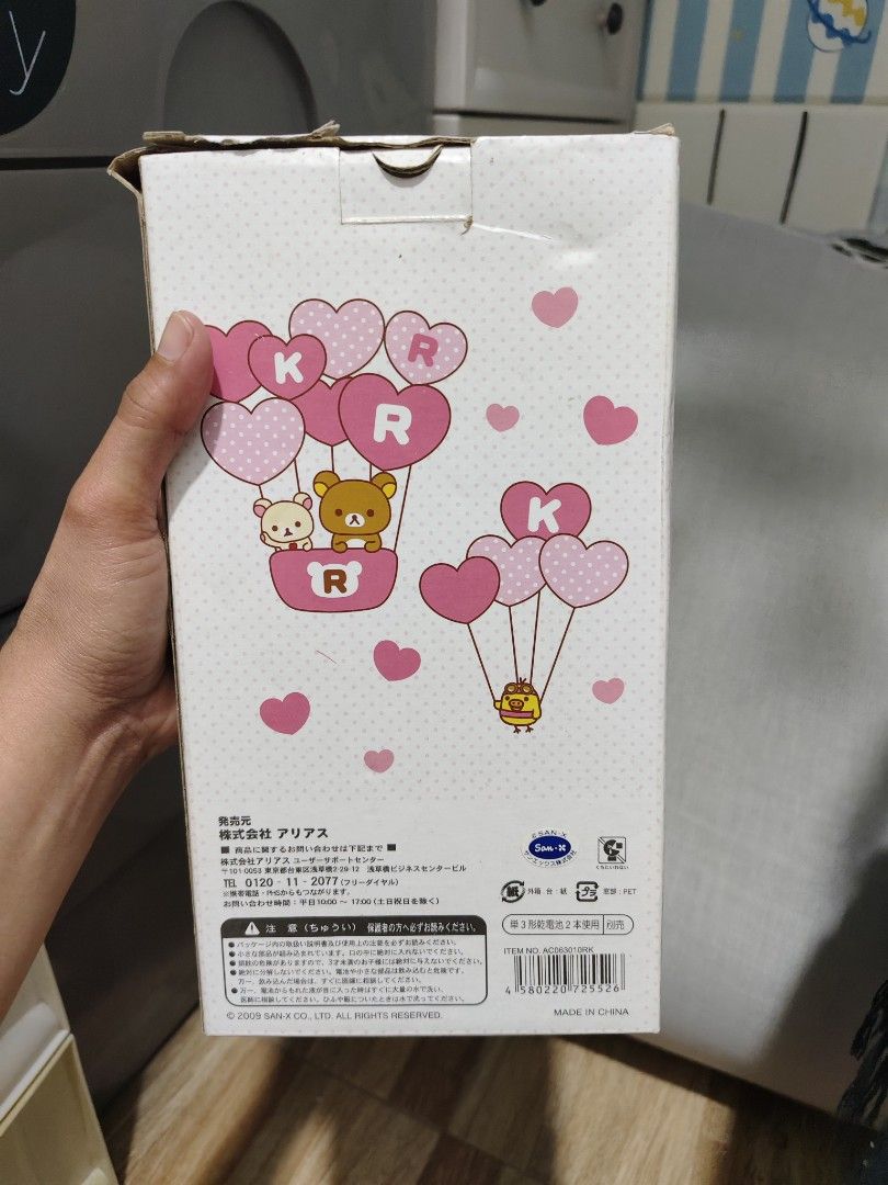Rilakkuma Korilakkuma Pendulum Clock (Category: Clocks) located in Makati City. Submitted by abegailbrezuela (Listing ID 1470805692, Image 2). Description: - Authentic Pink Rilakkuma pendulum clock - Features adorable Korilakkuma holding a chick on a swing - Clock face accented with cute hearts and Rilakkuma balloon design - Includes original packaging box (shows some storage wear and tear) - Item is safely stored inside its original box.