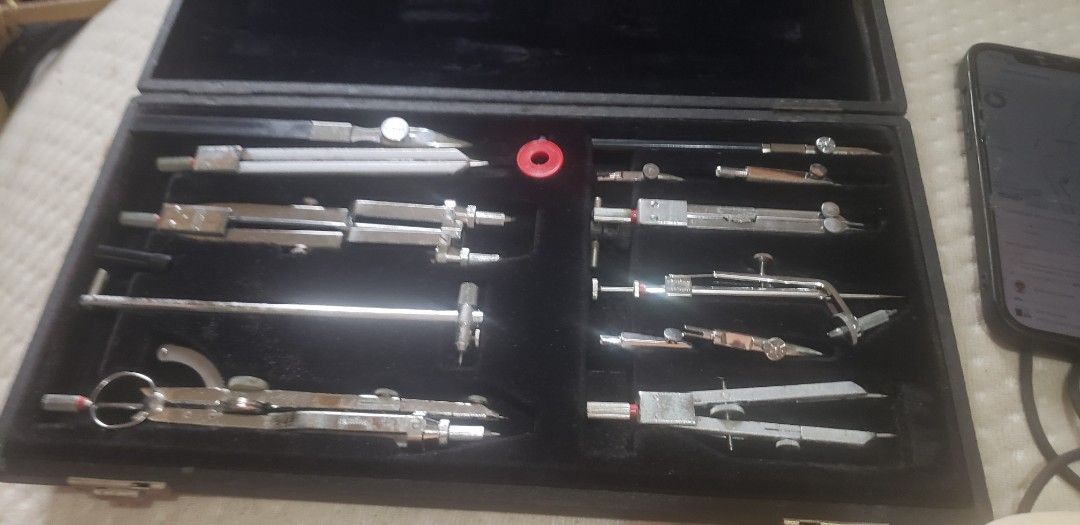 Rotring Professional Compass Set in Original Box (Category: Stationery & School Supplies) located in Marikina City. Submitted by racoon143 (Listing ID 1470775134, Image 1). Description: - Authentic vintage Rotring drafting tool set with German engineering - Includes multiple professional-grade compasses, extension bars, and specialized drawing instruments - Features fine adjustment screws and interchangeable attachments - Housed in an original ha