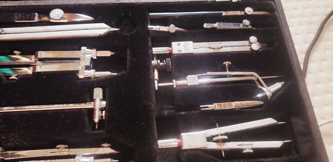 Rotring Professional Compass Set in Original Box (Category: Stationery & School Supplies) located in Marikina City. Submitted by racoon143 (Listing ID 1470775134, Image 3). Description: - Authentic vintage Rotring drafting tool set with German engineering - Includes multiple professional-grade compasses, extension bars, and specialized drawing instruments - Features fine adjustment screws and interchangeable attachments - Housed in an original ha