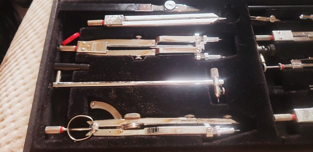 Rotring Professional Compass Set in Original Box (Category: Stationery & School Supplies) located in Marikina City. Submitted by racoon143 (Listing ID 1470775134, Image 2). Description: - Authentic vintage Rotring drafting tool set with German engineering - Includes multiple professional-grade compasses, extension bars, and specialized drawing instruments - Features fine adjustment screws and interchangeable attachments - Housed in an original ha