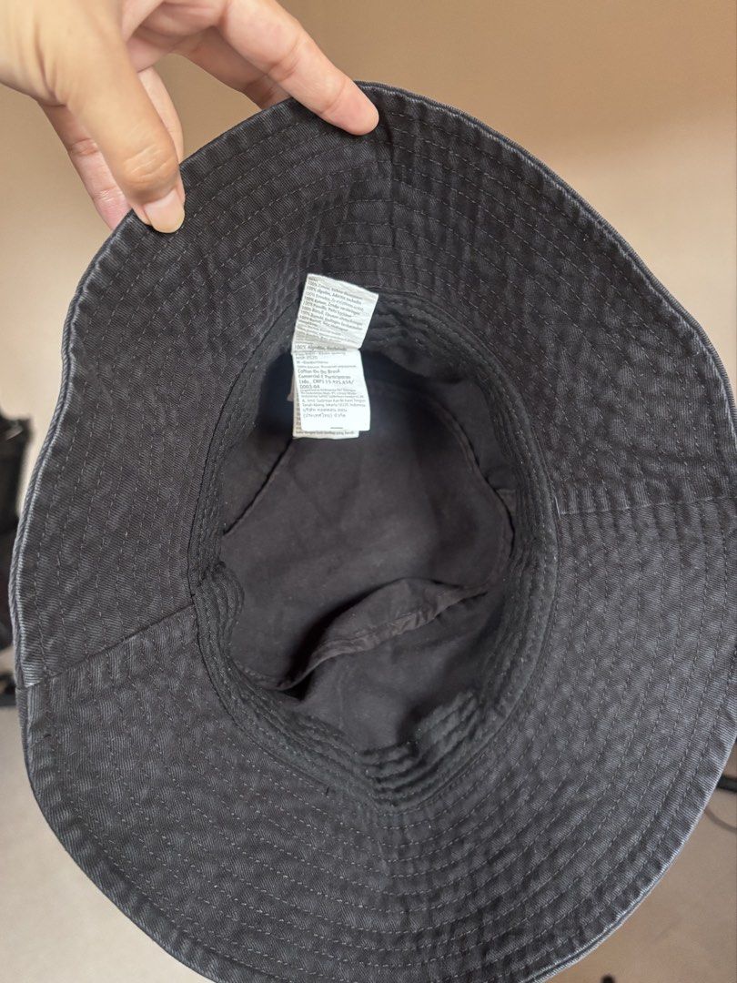 Rubi Black Cotton Bucket Hat (Category: Caps & Hats) located in Taguig. Submitted by solana36 (Listing ID 1470810589, Image 2). Description: - Brand: Rubi - Color: Black - Material: 100% cotton - Style: Classic casual / streetwear - Size: Standard fit - Orig price: Php799 SF c/o buyer (J&T or pick-up) Location: East Rembo, Taguig.