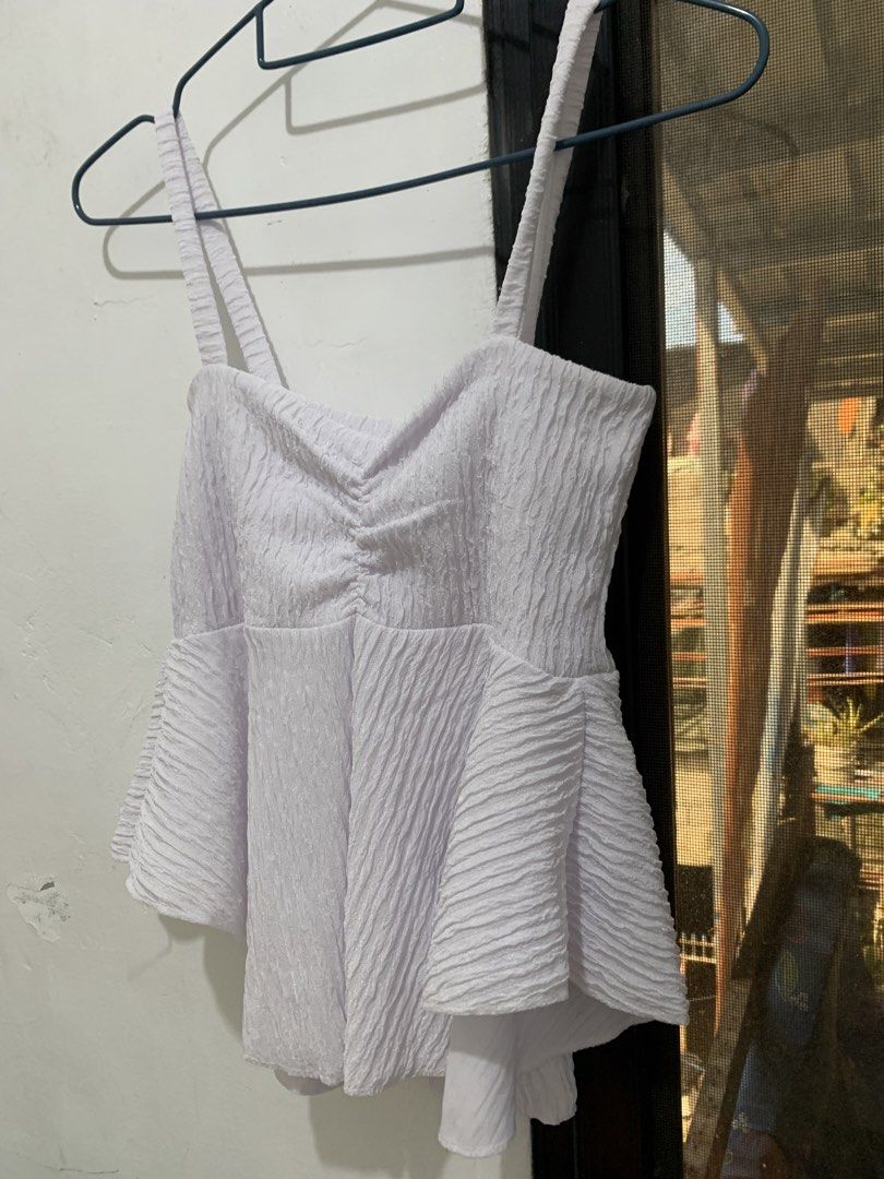 Ruched Bust Sleeveless Peplum Top (Category: Sleeveless) located in Caloocan City. Submitted by jjasss.mn_ (Listing ID 1470755289, Image 3). Description: Best for white theme errands .