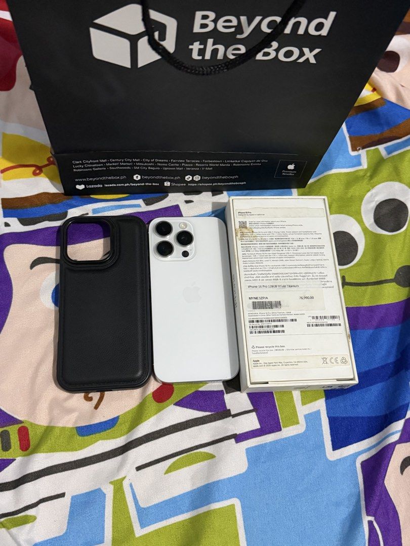 RUSH IPHONE 16 pro Complete Package (Category: Other Mobile & Gadget Accessories) located in Manila. Submitted by floweroniz (Listing ID 1470832186, Image 2). Description: IPHONE 16 PRO 128GB WHITE TITANIUM ₱36,990 first come first served po. respectfully lowballs will not be entertained Brand new price: ₱76,990 as shown sa likod ng box. my price is already 40k less :) • iPhone 16 pro 128gb • No sim restrictions • ZP/A variant • NTC Approved • 88
