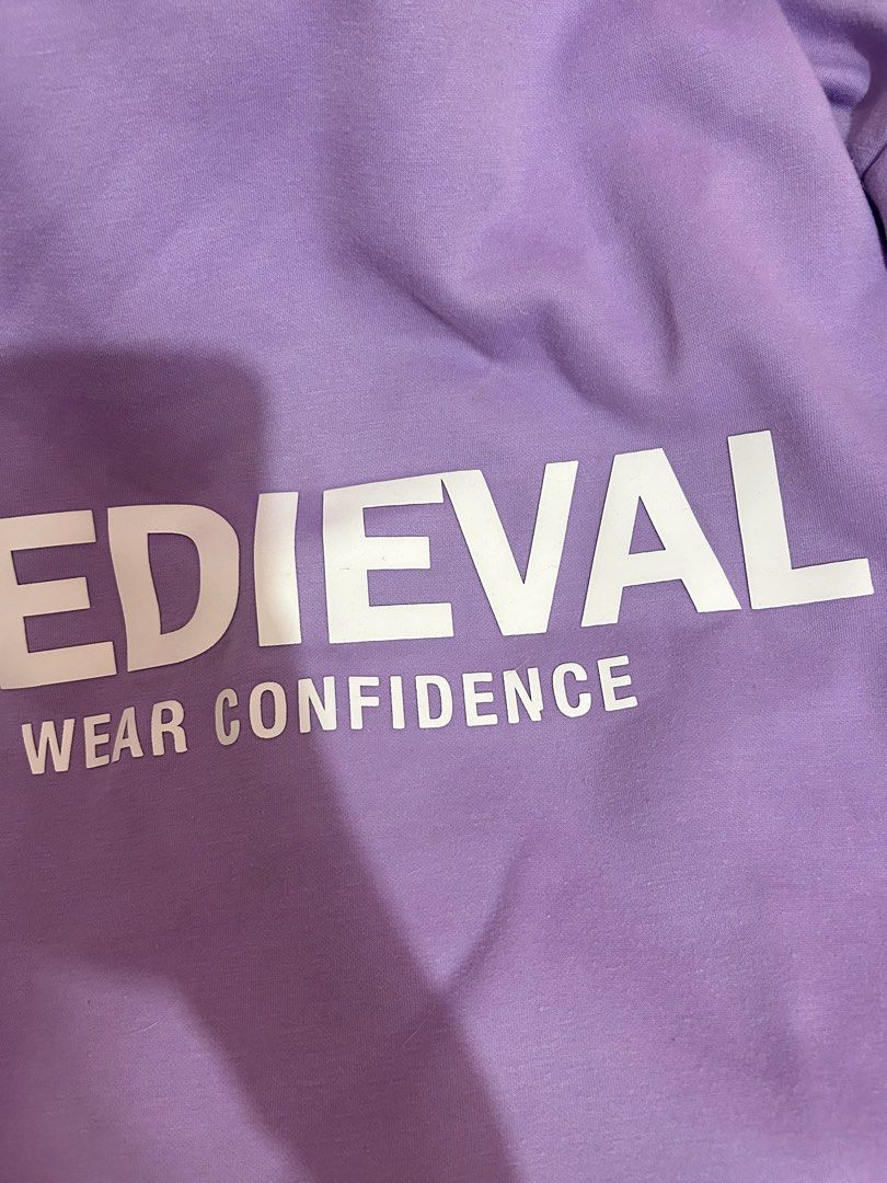RUSH!!! Medieval lavender hoodie small (Category: Hoodies) located in Manila. Submitted by lemon.meringuee (Listing ID 1470914884, Image 3). Description: RUSHHH!!! good condition (lady owned) small size (refer to the sizing chart at the last photo) i can provide free shipping thru j&t if you are within metro manila! no issues, minimal flaw lang sa letter n at the back .