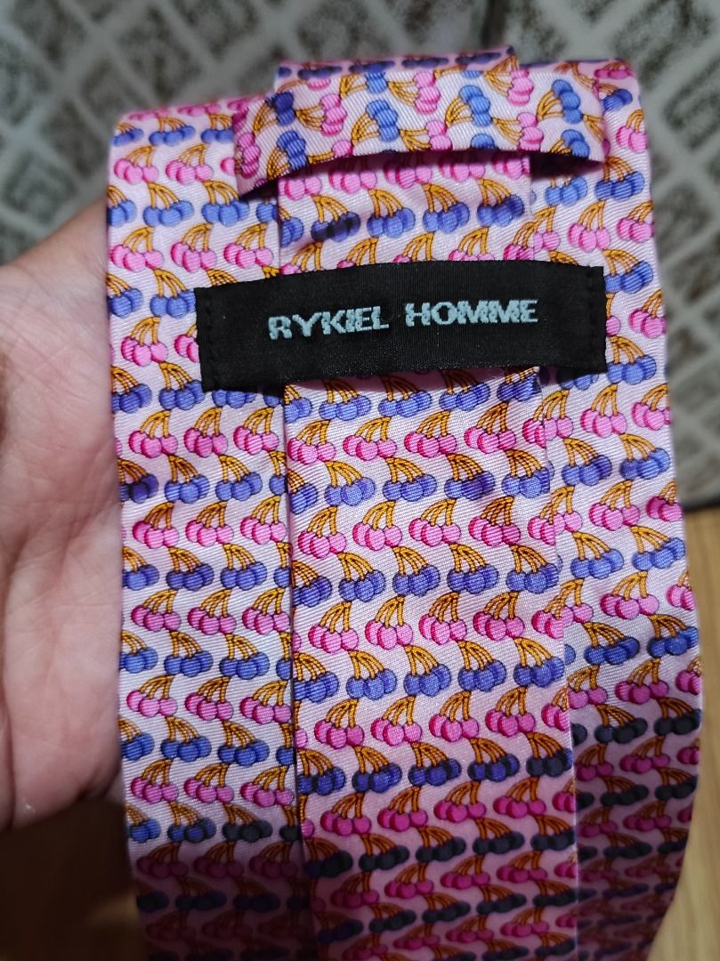 Rykiel Homme Cherry Print Silk Tie (Category: Ties) located in Makati City. Submitted by nyxhemera26 (Listing ID 1470811450, Image 3). Description: Rykiel Homme Cherry Print Silk Tie - Brand: Rykiel Homme - Material: 100% Silk (Made in France) - Color/Design: Pink with vibrant purple and pink cherries pattern - Style: Standard width necktie - Condition/Use: Great for adding color and personality to formal wear or business casual outfits .