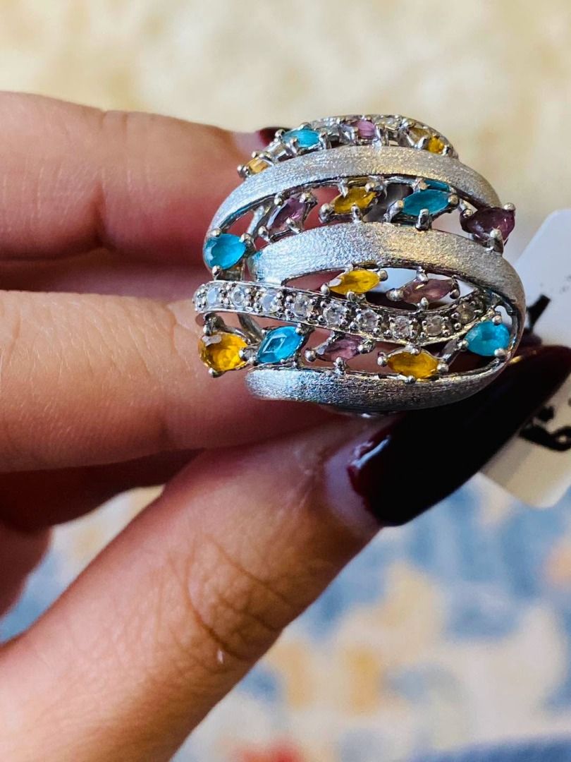 S7.5 VINTAGE CHUNKY MULTIGEM SILVER RING (Category: Rings) located in Baguio. Submitted by asna_taku (Listing ID 1470819667, Image 3). Description: ✨💎 VINTAGE CHUNKY MULTIGEM SILVER RING 💎✨ A stunning statement piece bursting with colors and vintage elegance! 🌈💖 Beautifully designed with vibrant blue, golden-yellow, and purple gemstones, complemented by sparkling accent stones. Its bold, intertwined silver bands feature a gorgeous textured fi