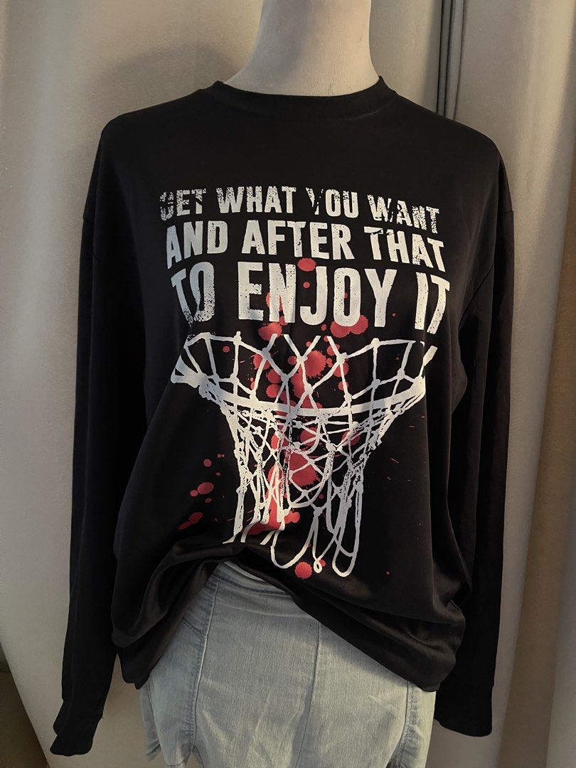 Sa Gear Basketball drifit (Category: Activewear) located in Cainta. Submitted by zlove111 (Listing ID 1470789810, Image 2). Description: - Brand: SA Gear - Style: Black long-sleeve crewneck shirt with a relaxed fit - Design: Large basketball net graphic with red splatters and motivational quote on the front - Details: Brand logo printed near the bottom hem - Material: Comfortable, high-quality fabric - Condition: Excellent / Pre-loved (manage exp