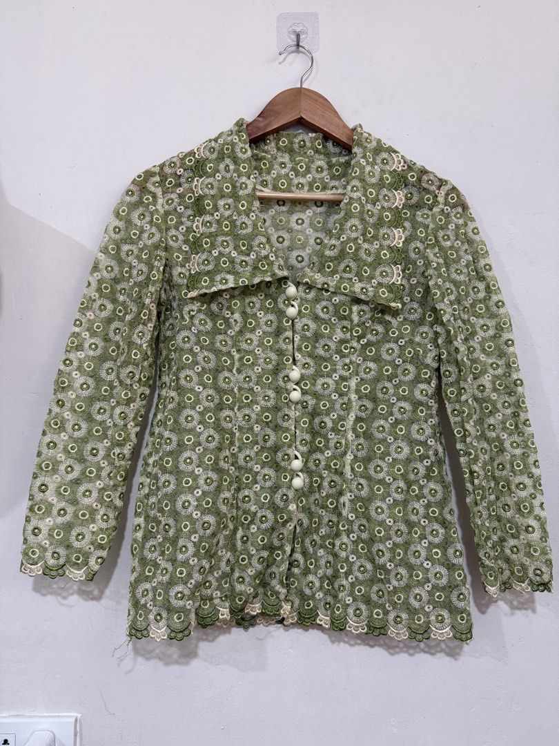 Sage Olive green Top floral eyelet (Category: Longsleeves) located in Manila. Submitted by morningthrifters (Listing ID 1470891661, Image 2). Description: 📝 green long-sleeved button-down jacket or blouse featuring a repeating floral lace or eyelet pattern with a large collared neckline and scalloped trim. 📍Pateros Metro Manila 🚚 Jnt / Lalamove / Pickup 📐 Size small 💗 Second time buyers has a free item, follow me to get updated. ⚠️ Please ma