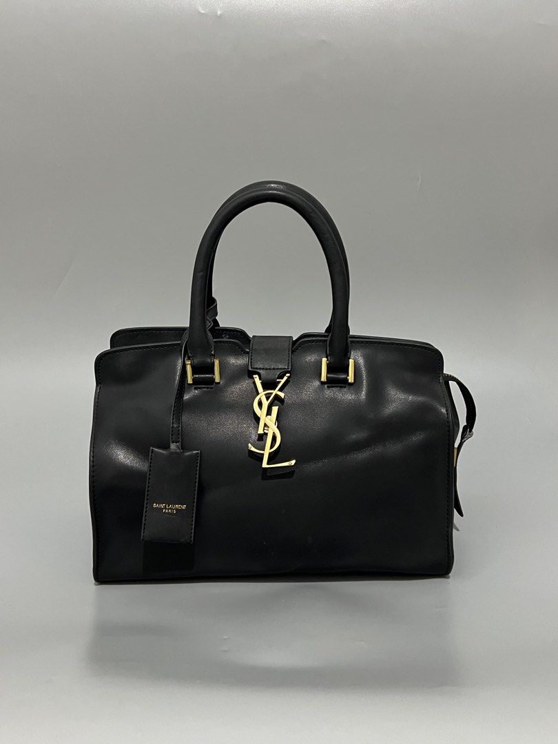 Saint Laurent - YSL - Hand Bag - Leather (Category: Shoulder Bags) located in Cavite. Submitted by asianluxe (Listing ID 1470899299, Image 1). Description: Saint Laurent Paris - YSL - Measurements! Length: 8.5 Inches Width: 11.5 Inches Depth: 4.5 inches Good condition Very presentable No flaw or damage!.