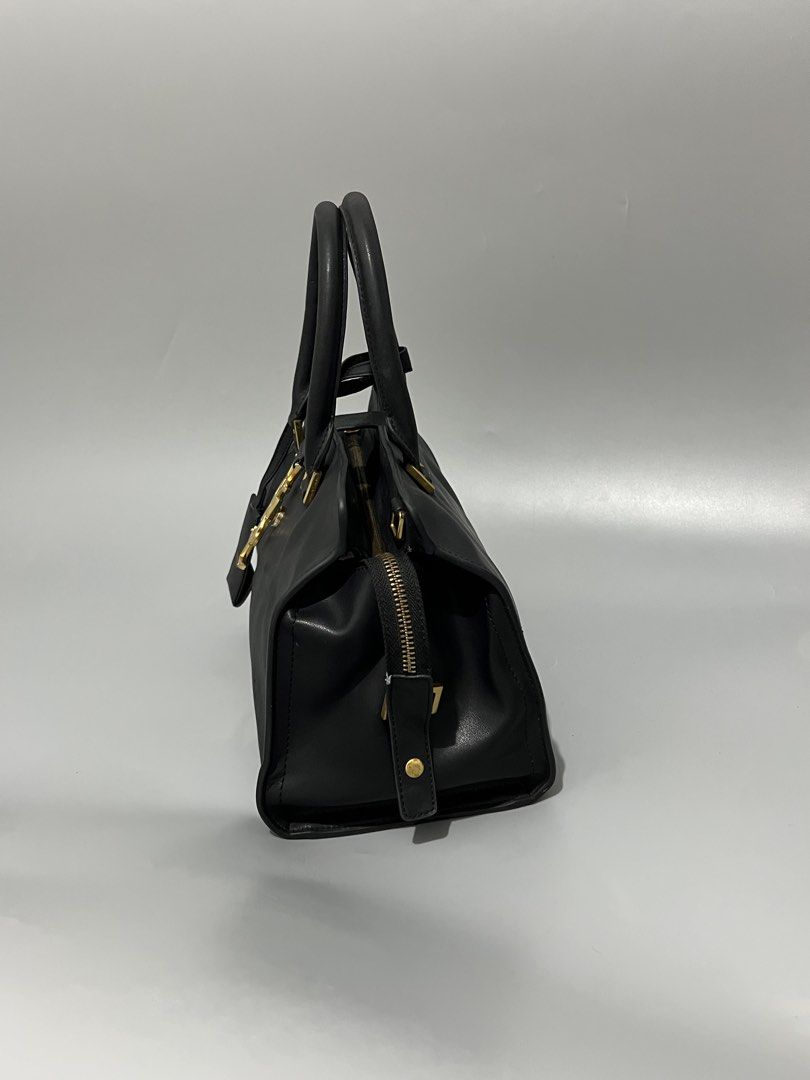 Saint Laurent - YSL - Hand Bag - Leather (Category: Shoulder Bags) located in Cavite. Submitted by asianluxe (Listing ID 1470899299, Image 3). Description: Saint Laurent Paris - YSL - Measurements! Length: 8.5 Inches Width: 11.5 Inches Depth: 4.5 inches Good condition Very presentable No flaw or damage!.
